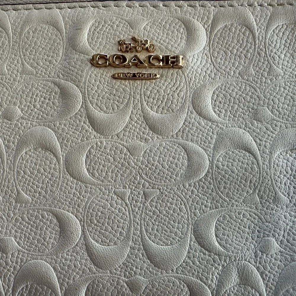 Authentic Coach signature embossed Chalk Wristlet